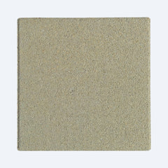 Square piece of textured ceramic on a white background
