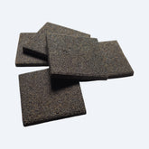 Four black square ceramic frag disc on a white background