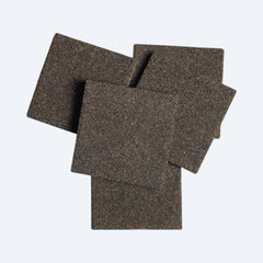 Five pieces of brown ceramic frag disc on a light background